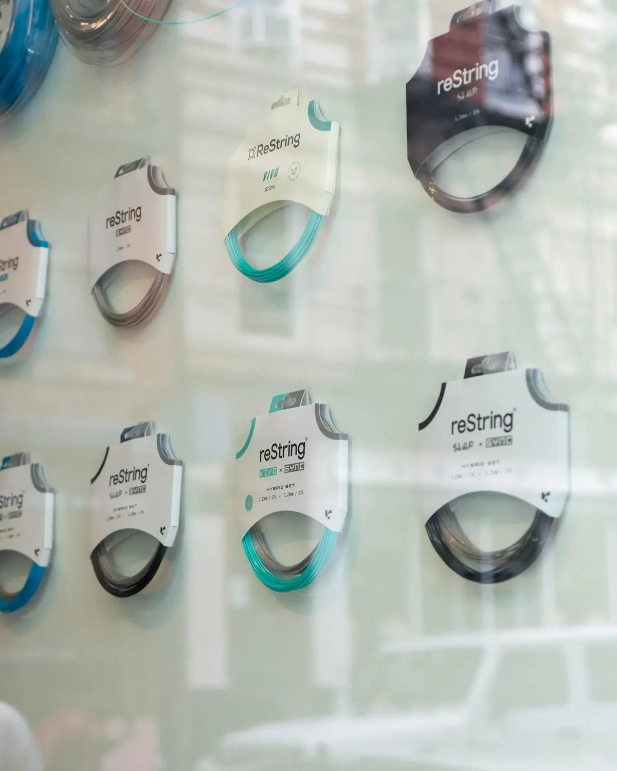 reString string packs on a shop wall